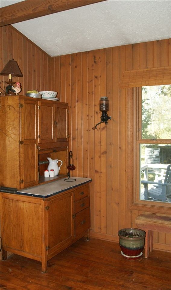 14476 Russellville Road Capron, IL 61012 - Photo 14 of 25 a room with a table and a chair