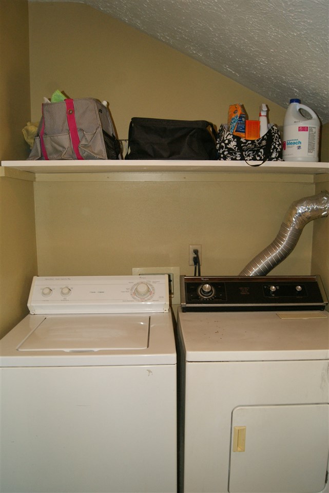 14476 Russellville Road Capron, IL 61012 - Photo 22 of 25 a utility room with dryer and washer