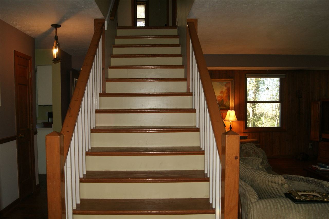 14476 Russellville Road Capron, IL 61012 - Photo 9 of 25 a view of entryway and hall with wooden floor