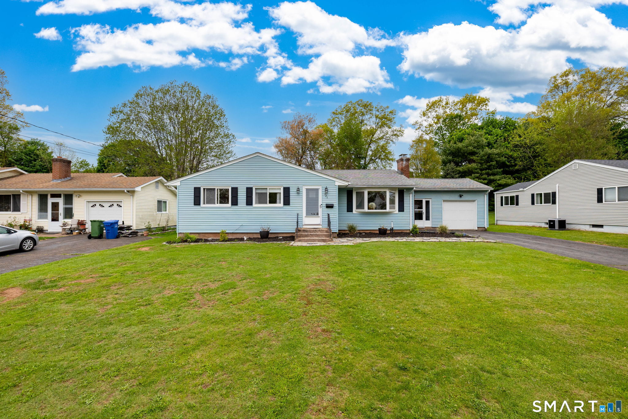325 Barbara Road Middletown, CT 06457 - Photo 22 of 40 a front view of a house with garden