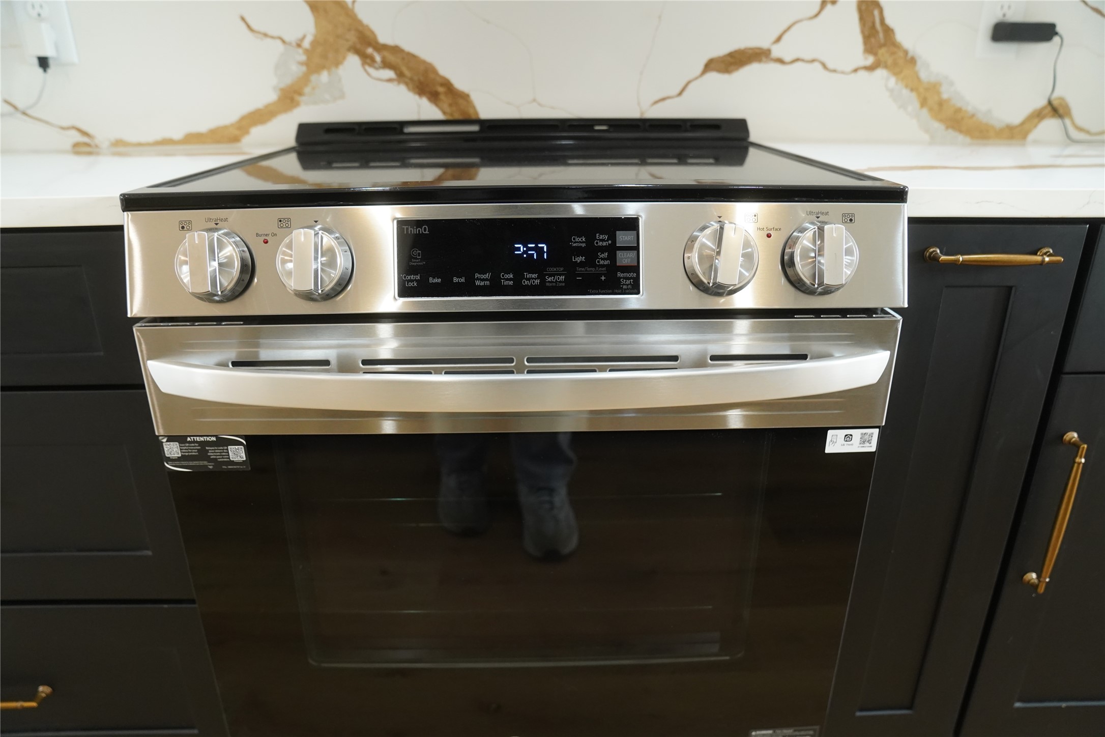 5947 Collingsworth Street Houston, TX 77026 - Photo 14 of 39 a close view of fireplace with wooden frame