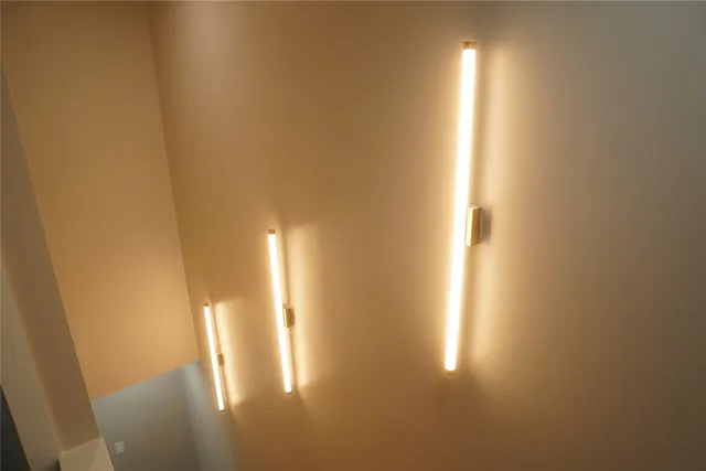 a bathroom with a sink a mirror and shower