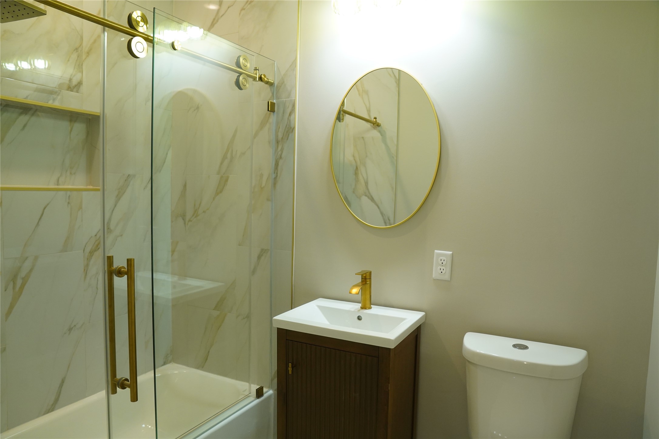 5947 Collingsworth Street Houston, TX 77026 - Photo 29 of 39 a bathroom with a sink and a mirror