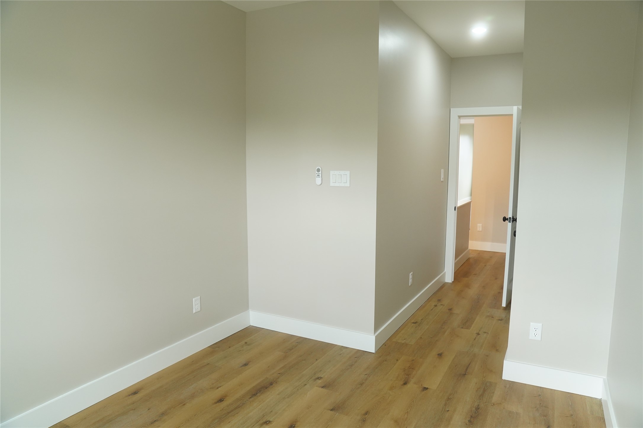 5947 Collingsworth Street Houston, TX 77026 - Photo 33 of 39 a view of a hallway with wooden floor