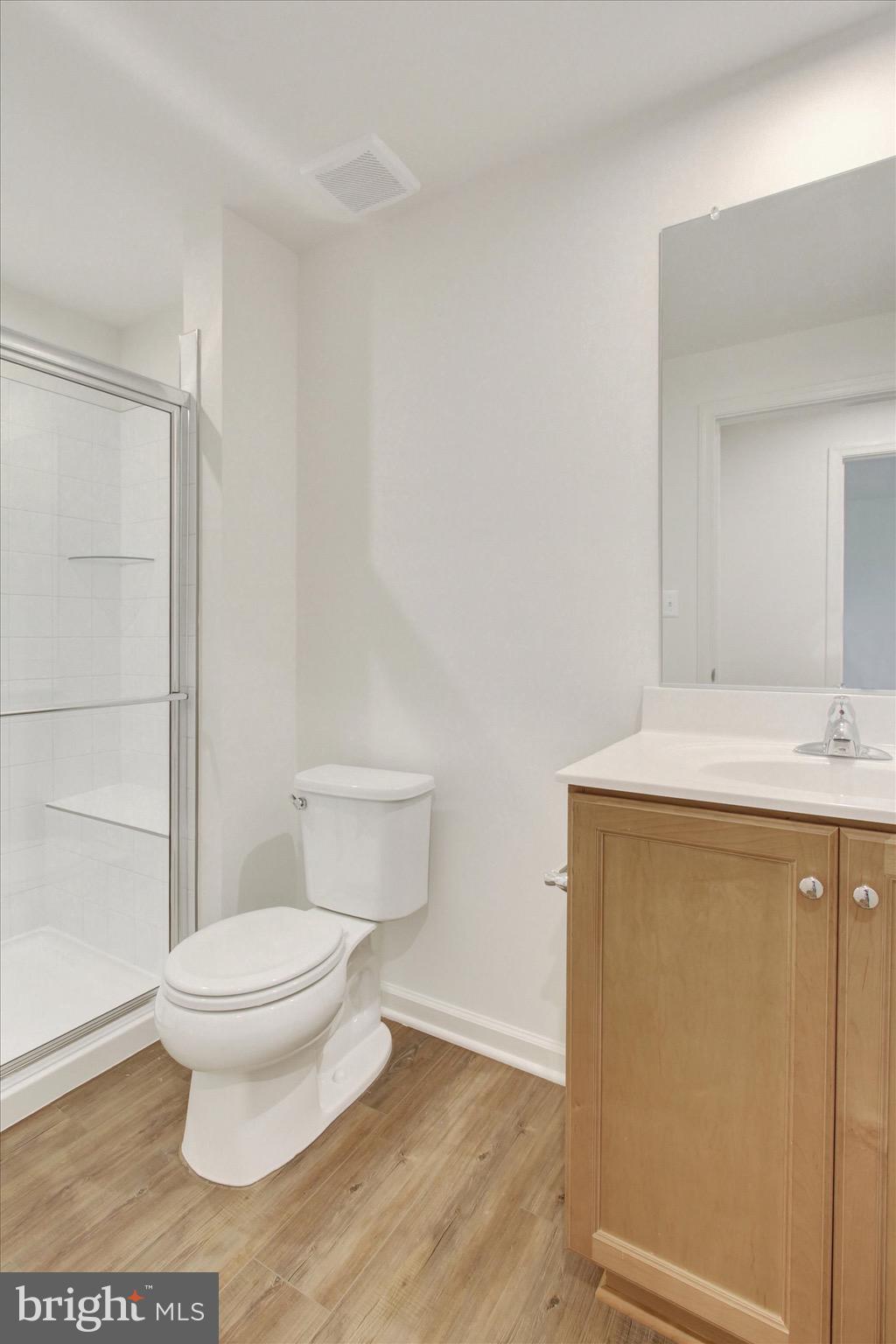 107 Homestead Drive Hanover, PA 17331 - Photo 9 of 34 a bathroom with a sink a toilet and a mirror