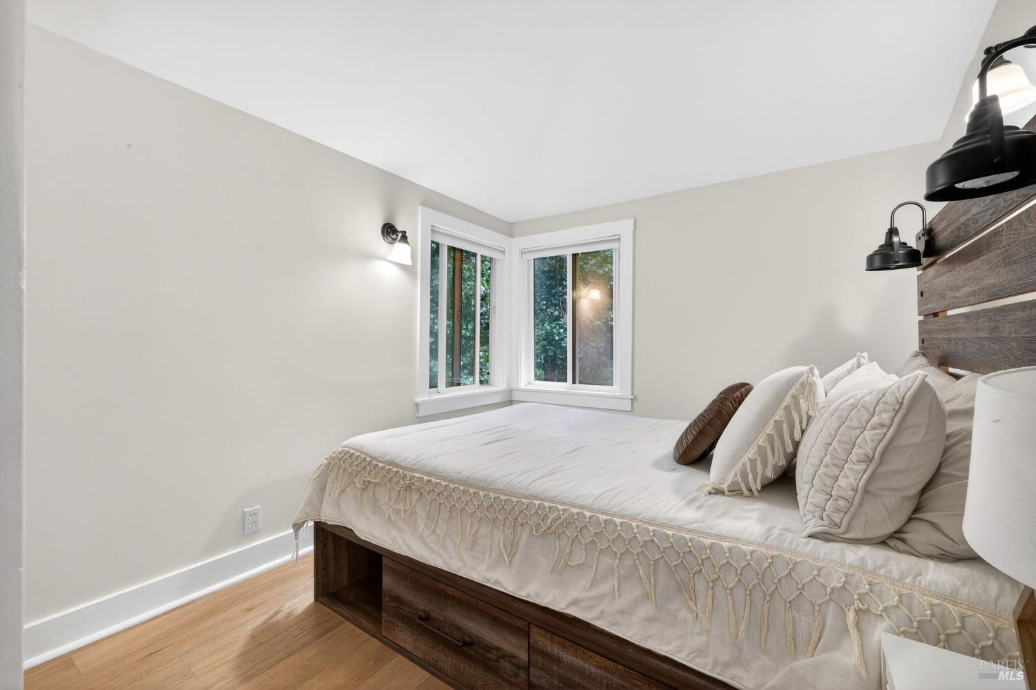 17731 Old Monte Rio Road Guerneville, CA 95446 - Photo 21 of 57 a bedroom with a bed and a window