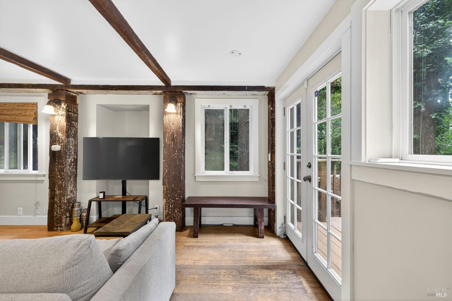 17731 Old Monte Rio Road Guerneville, CA 95446 - Photo 24 of 57 a living room with furniture and a flat screen tv