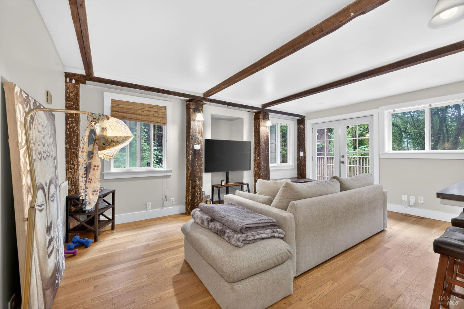 17731 Old Monte Rio Road Guerneville, CA 95446 - Photo 27 of 57 a living room with furniture and a flat screen tv