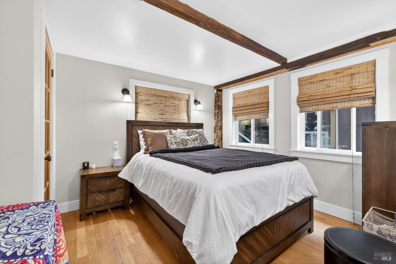 17731 Old Monte Rio Road Guerneville, CA 95446 - Photo 31 of 57 a bedroom with a bed and wooden floor