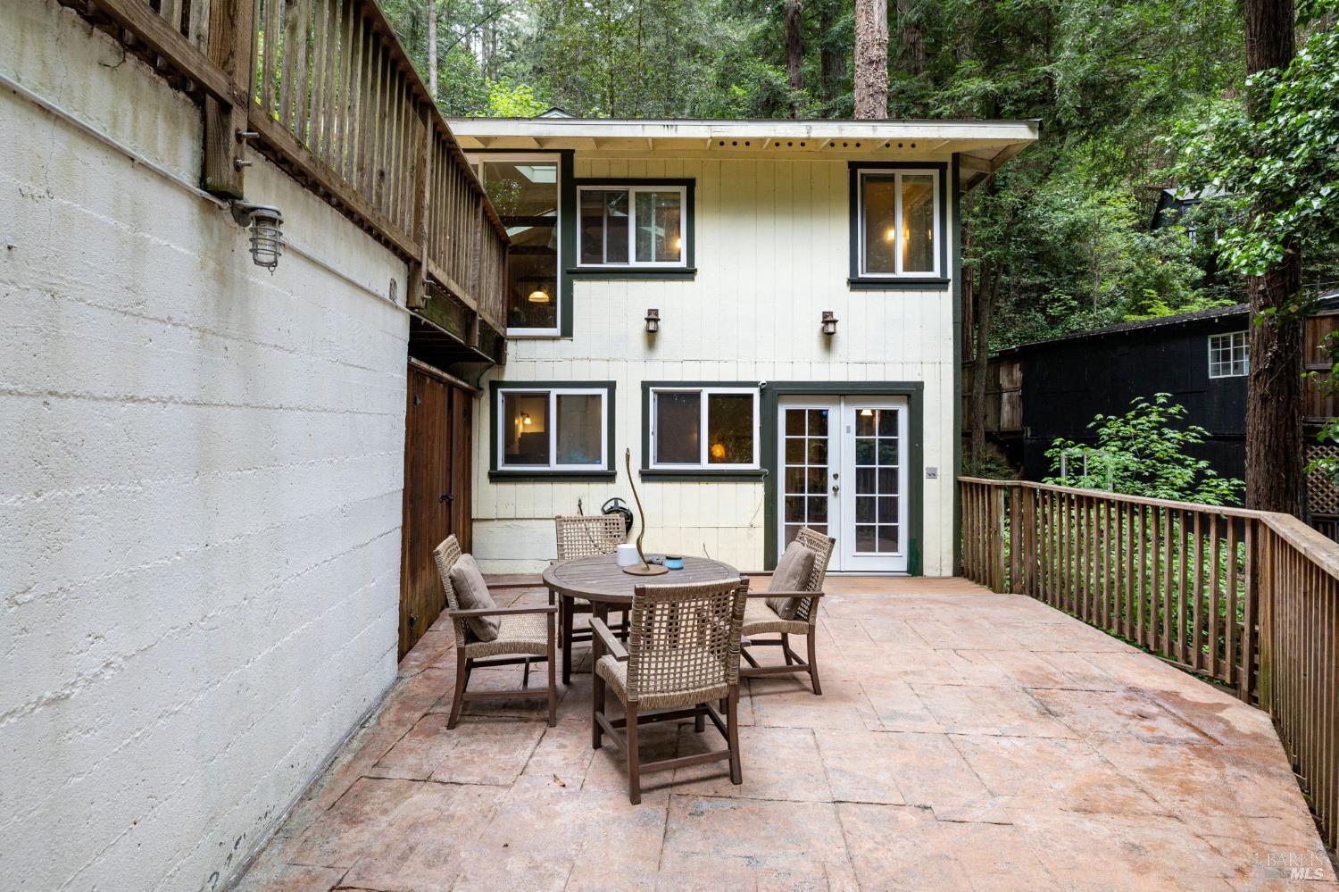 17731 Old Monte Rio Road Guerneville, CA 95446 - Photo 35 of 57 a view of a patio with a table and chairs