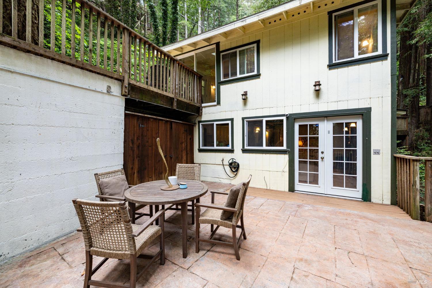 17731 Old Monte Rio Road Guerneville, CA 95446 - Photo 36 of 57 a backyard of a house with table and chairs
