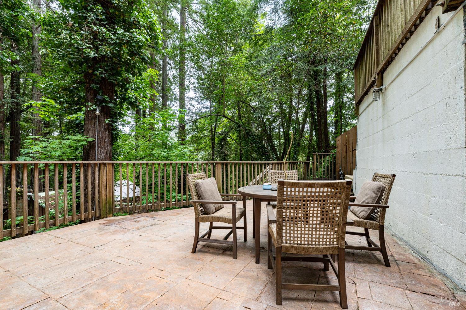 17731 Old Monte Rio Road Guerneville, CA 95446 - Photo 39 of 57 a view of a chairs and table in the back yard