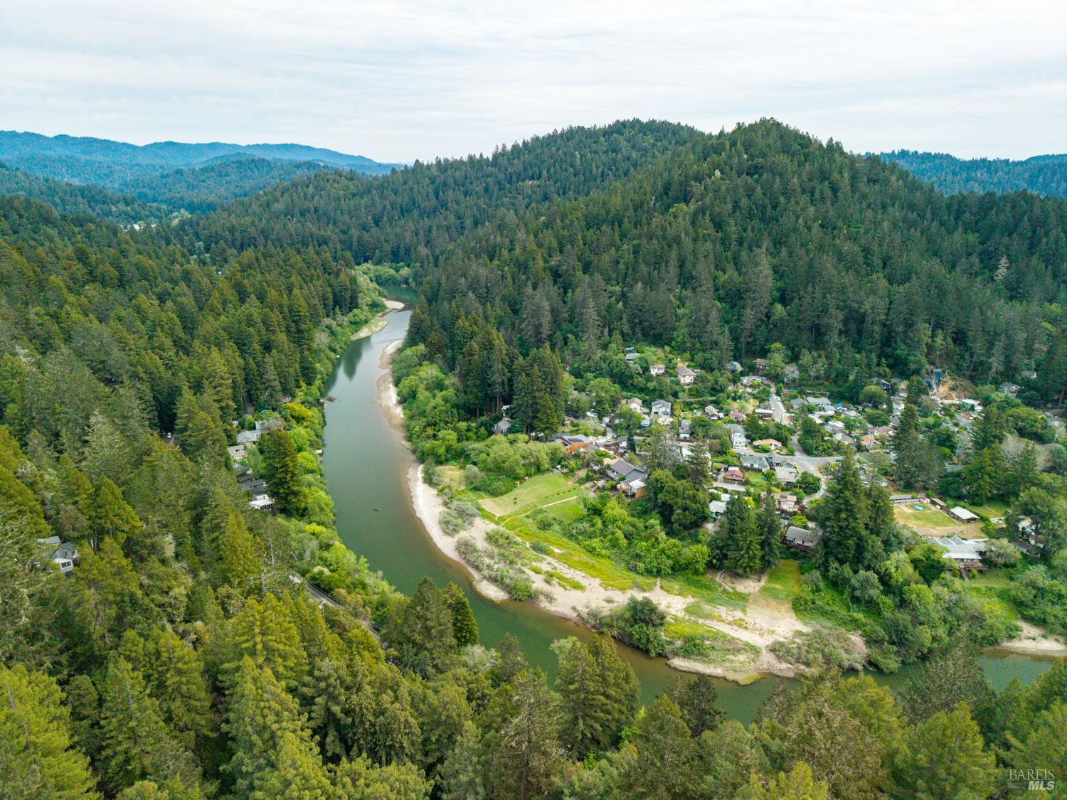 17731 Old Monte Rio Road Guerneville, CA 95446 - Photo 56 of 57 a view of a lush green forest with trees in the background
