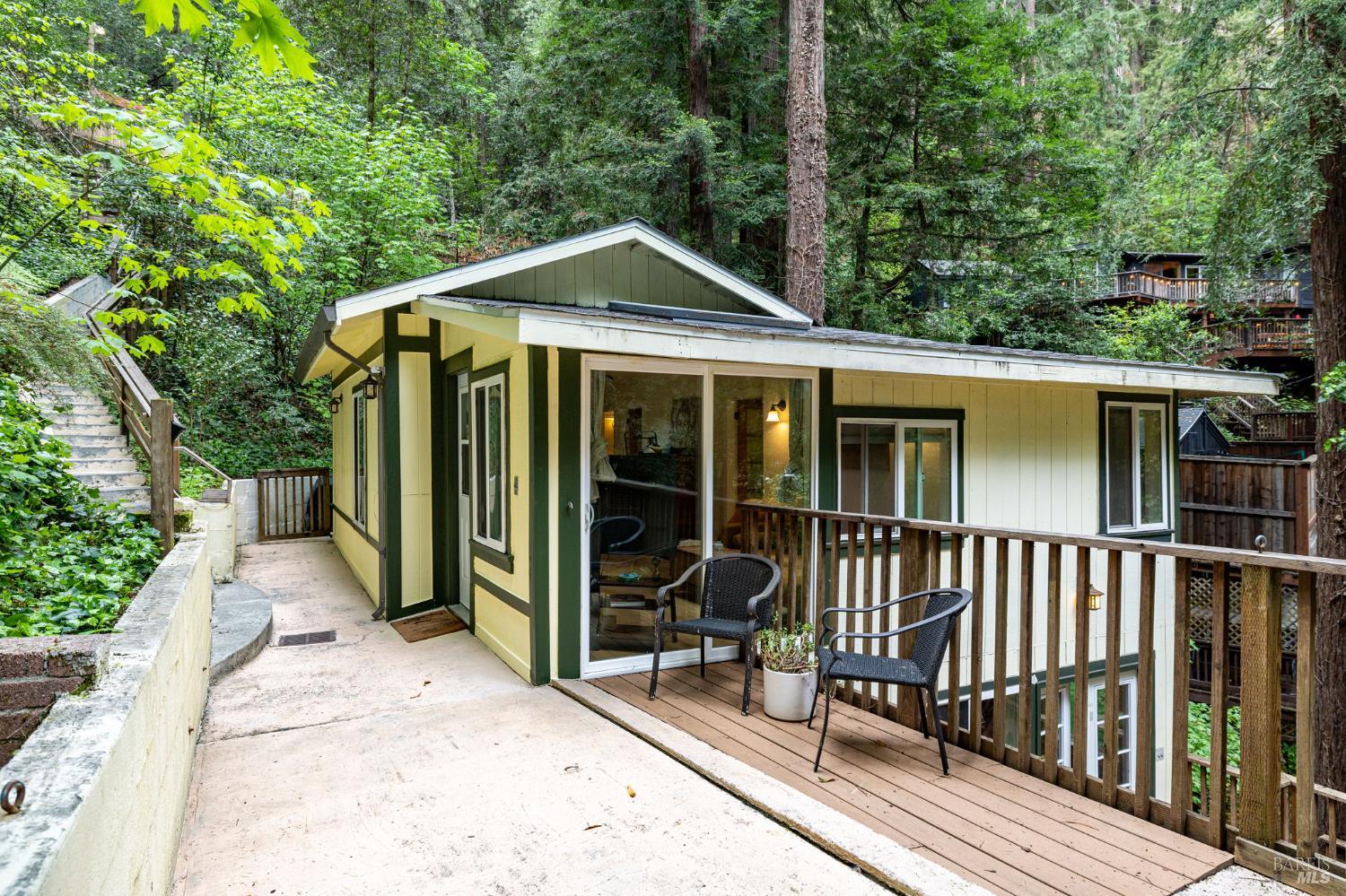 17731 Old Monte Rio Road Guerneville, CA 95446 - Photo 57 of 57 a view of a house with a porch and wooden fence