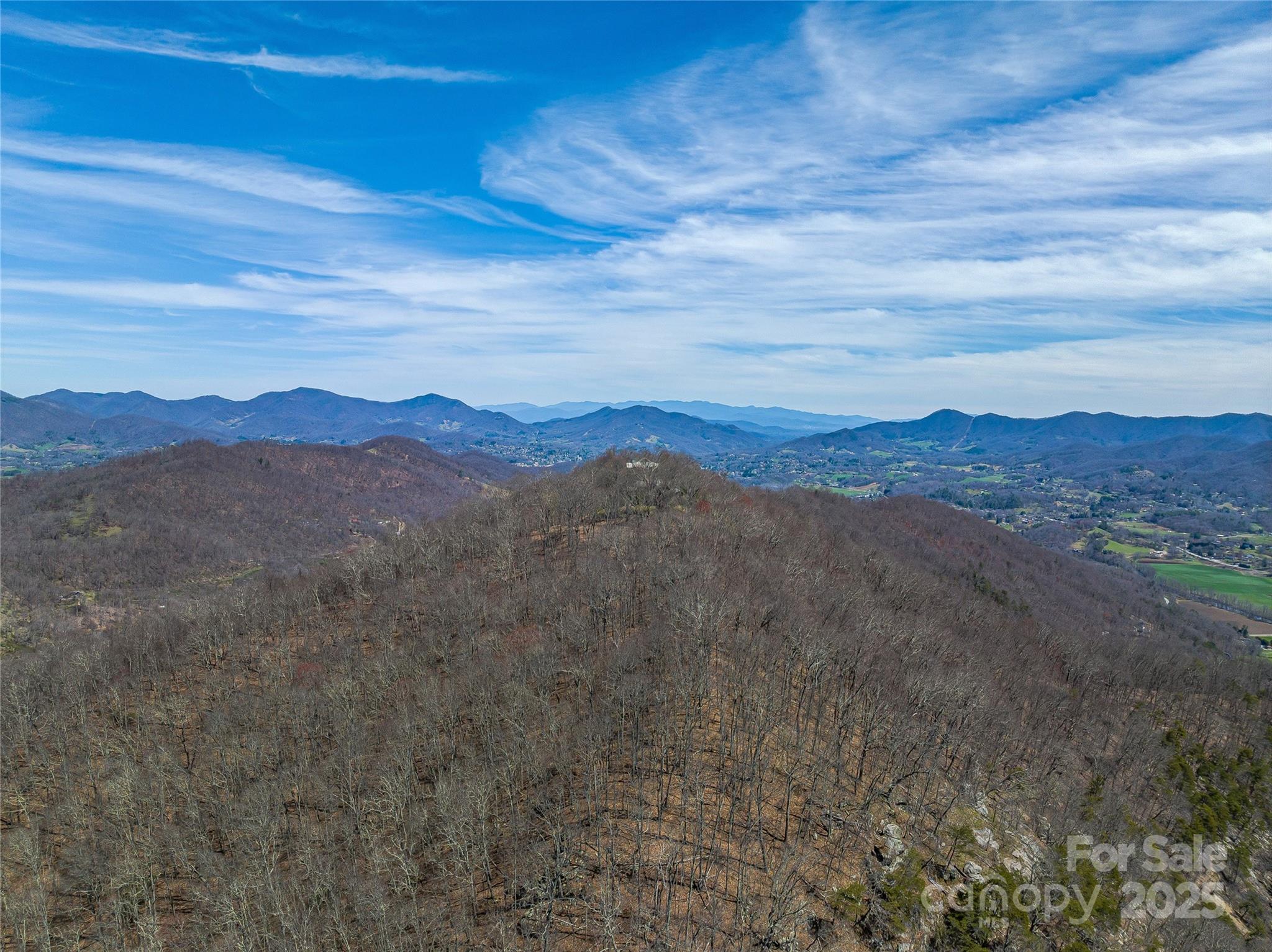 999 Cracker Trail Clyde, NC 28721 - Photo 16 of 23 a view of mountain with sunset in background