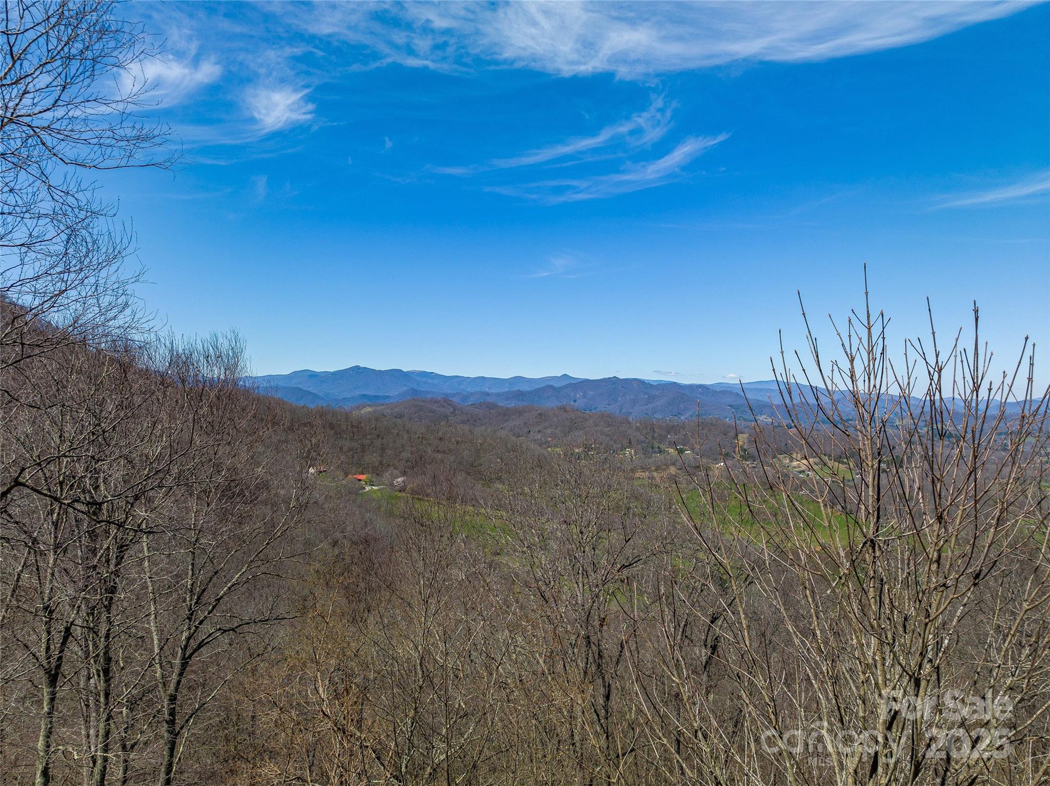999 Cracker Trail Clyde, NC 28721 - Photo 10 of 23 a view of mountain with sunset in background