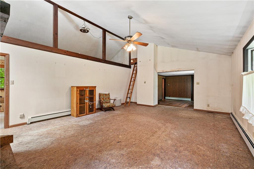 237 Leslie Road Valencia, PA 16059 - Photo 9 of 29 a view of empty room with stairs and white walls