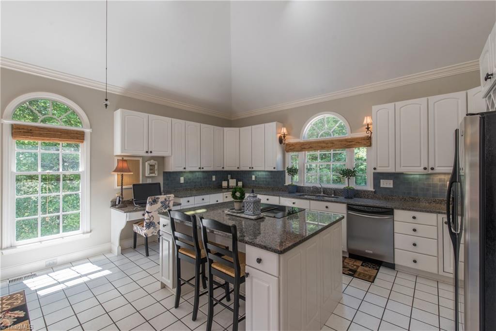 1511 Carters Grove Road Clemmons, NC 27012 - Photo 12 of 30 Large kitchen open to a large dining area deck entrance.