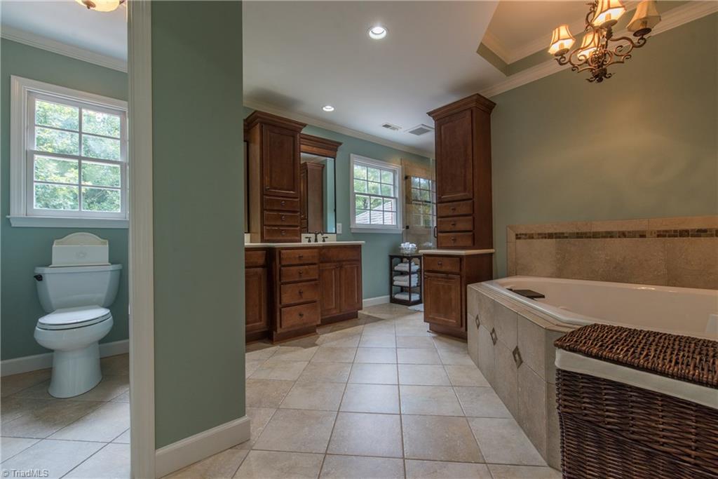 1511 Carters Grove Road Clemmons, NC 27012 - Photo 18 of 30 Master Bathroom with separate shower and whirlpool tub.