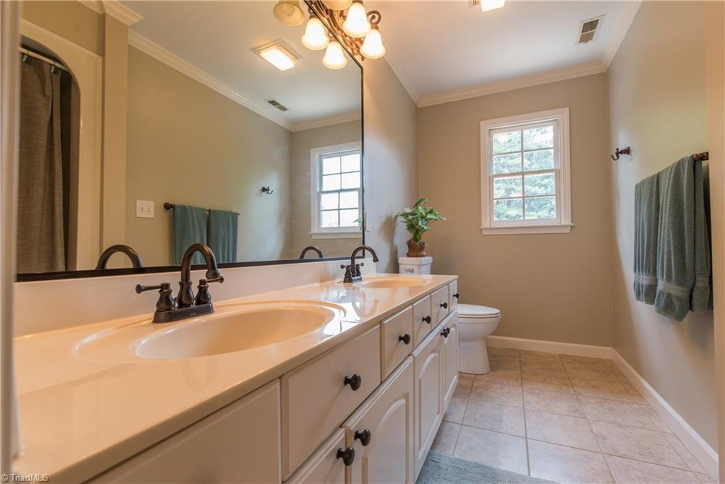 1511 Carters Grove Road Clemmons, NC 27012 - Photo 23 of 30 Hall Bathroom Upstairs with double sinks.