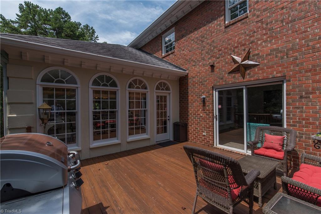 1511 Carters Grove Road Clemmons, NC 27012 - Photo 30 of 30 Large deck off the kitchen/dining area and den.