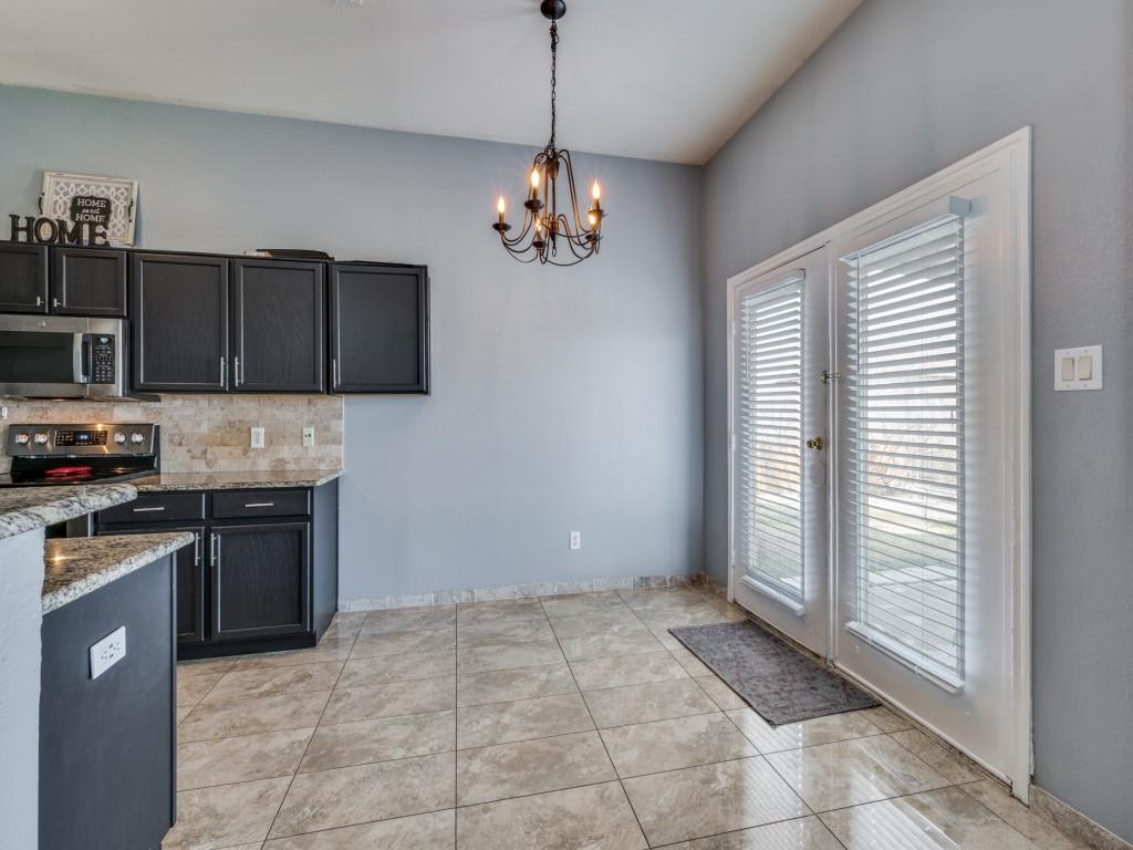 305 Sheridan Road Oak Point, TX 75068 - Photo 12 of 25 a kitchen with a refrigerator a stove top oven a sink and dishwasher