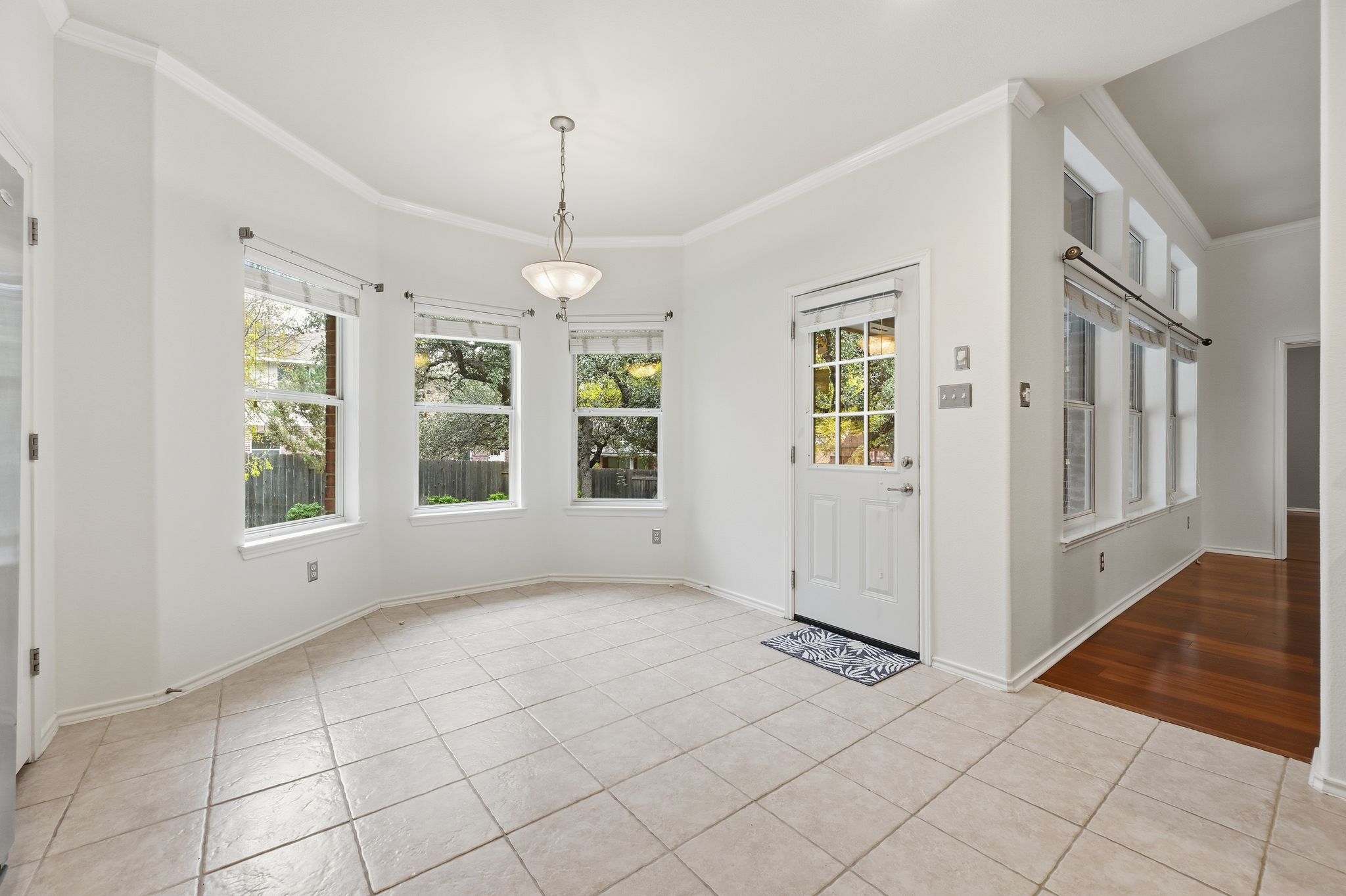 202 Muscovy Lane Cedar Park, TX 78613 - Photo 12 of 34 a view of an empty room with window and chandelier fan