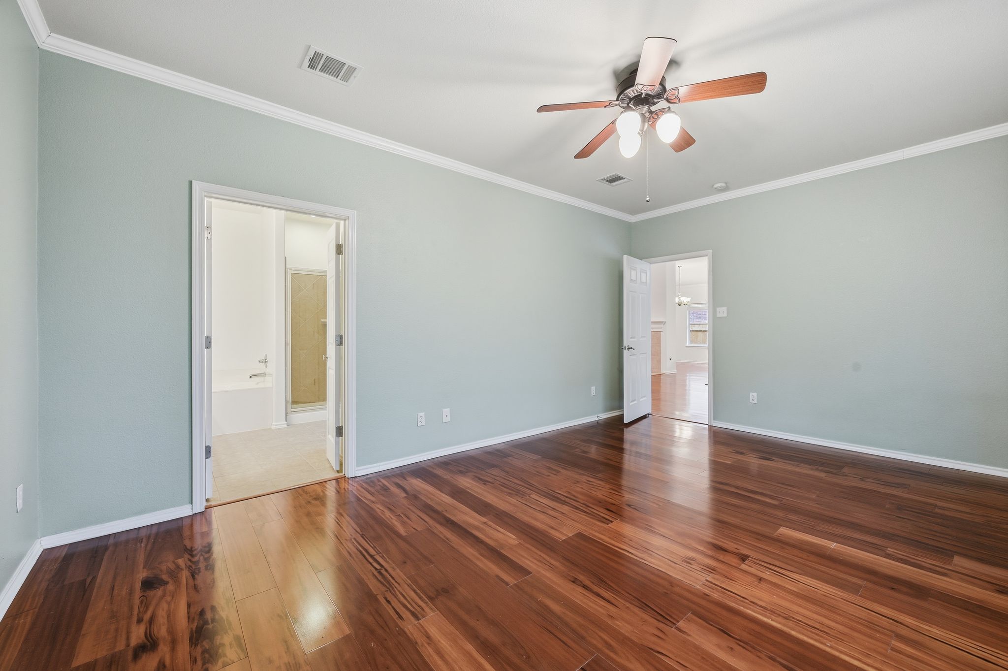 202 Muscovy Lane Cedar Park, TX 78613 - Photo 15 of 34 an empty room with wooden floor and ceiling fan