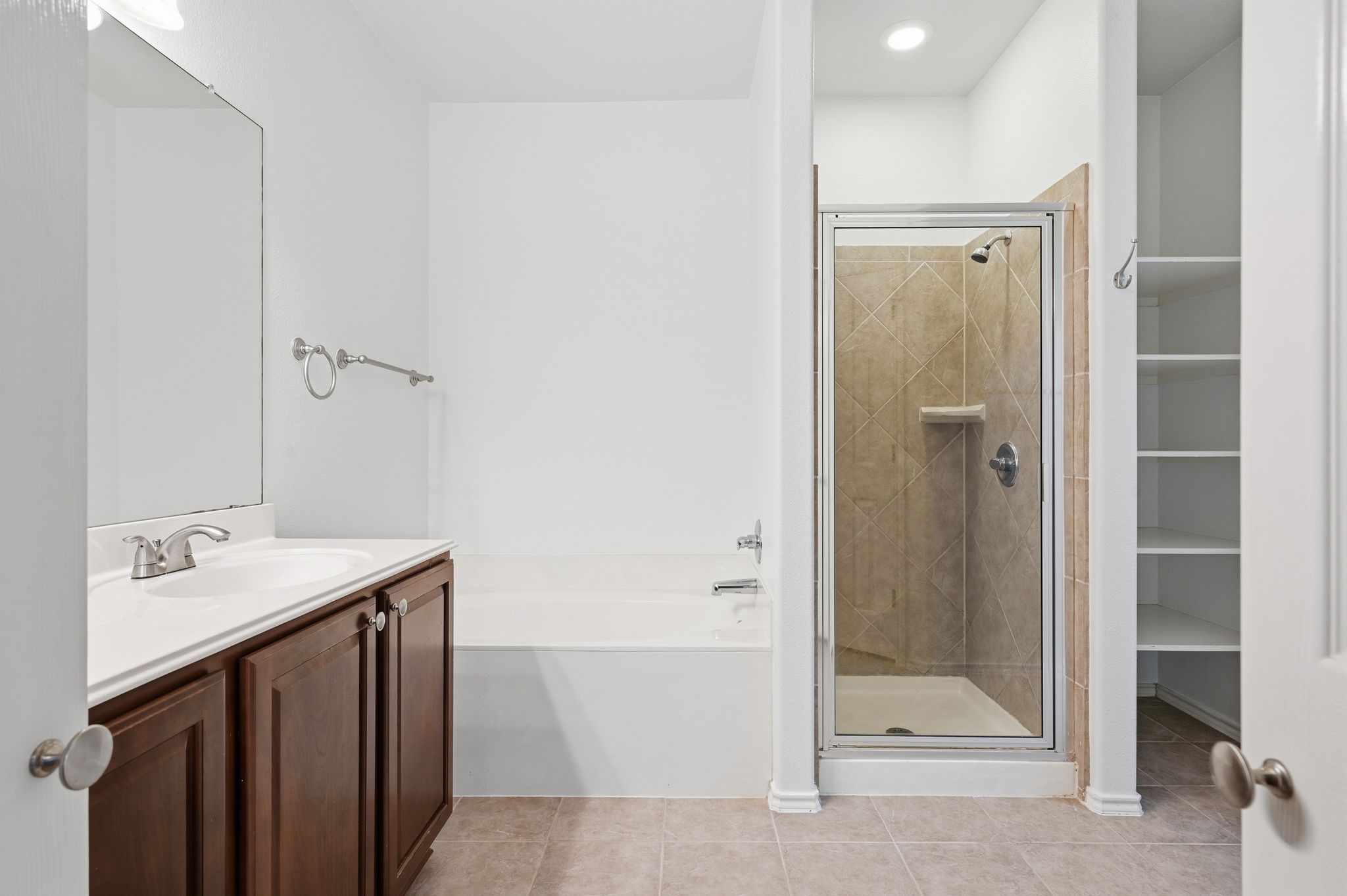 202 Muscovy Lane Cedar Park, TX 78613 - Photo 17 of 34 a bathroom with a sink and a mirror