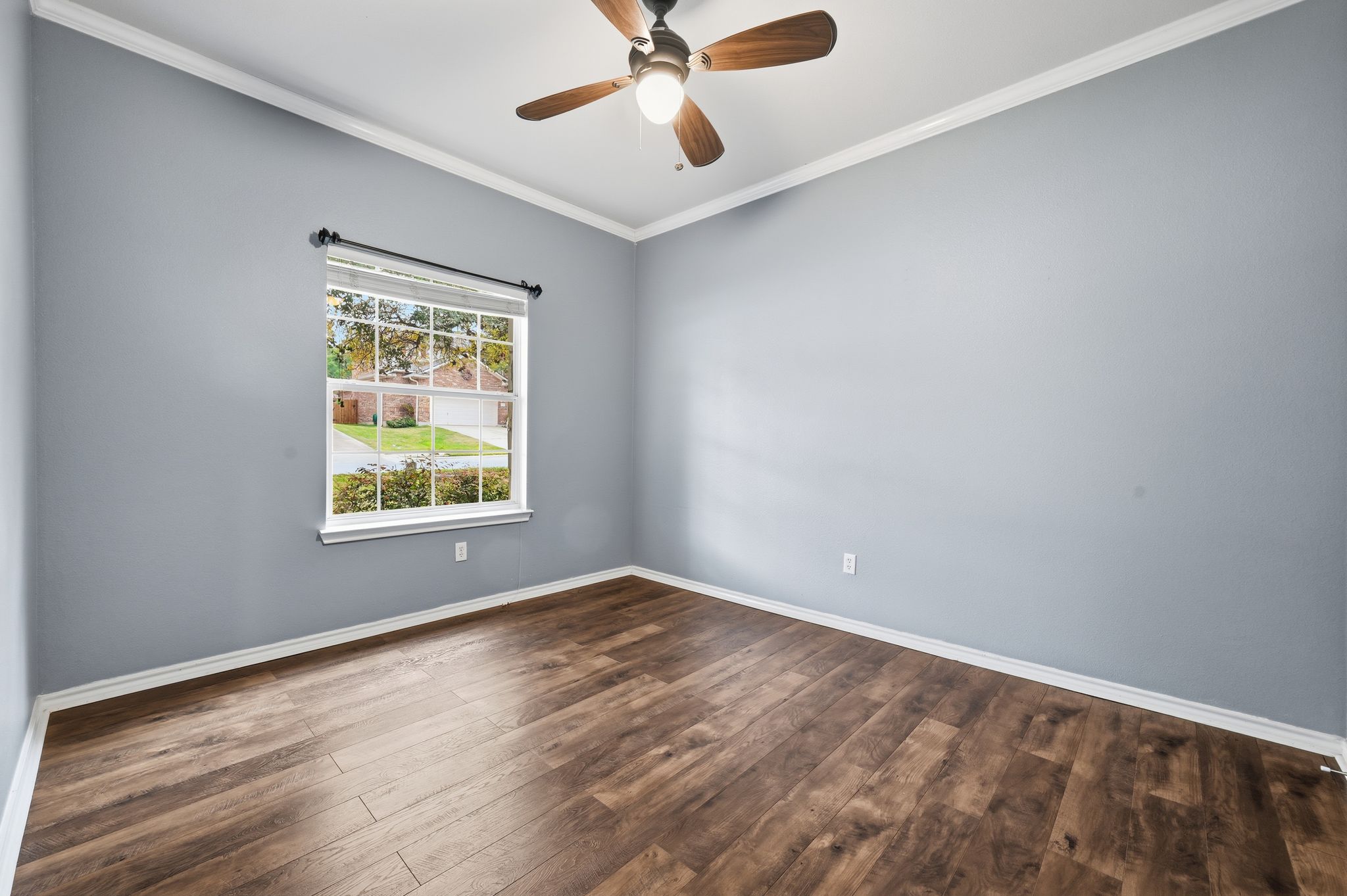 202 Muscovy Lane Cedar Park, TX 78613 - Photo 22 of 34 an empty room with a window and a fan