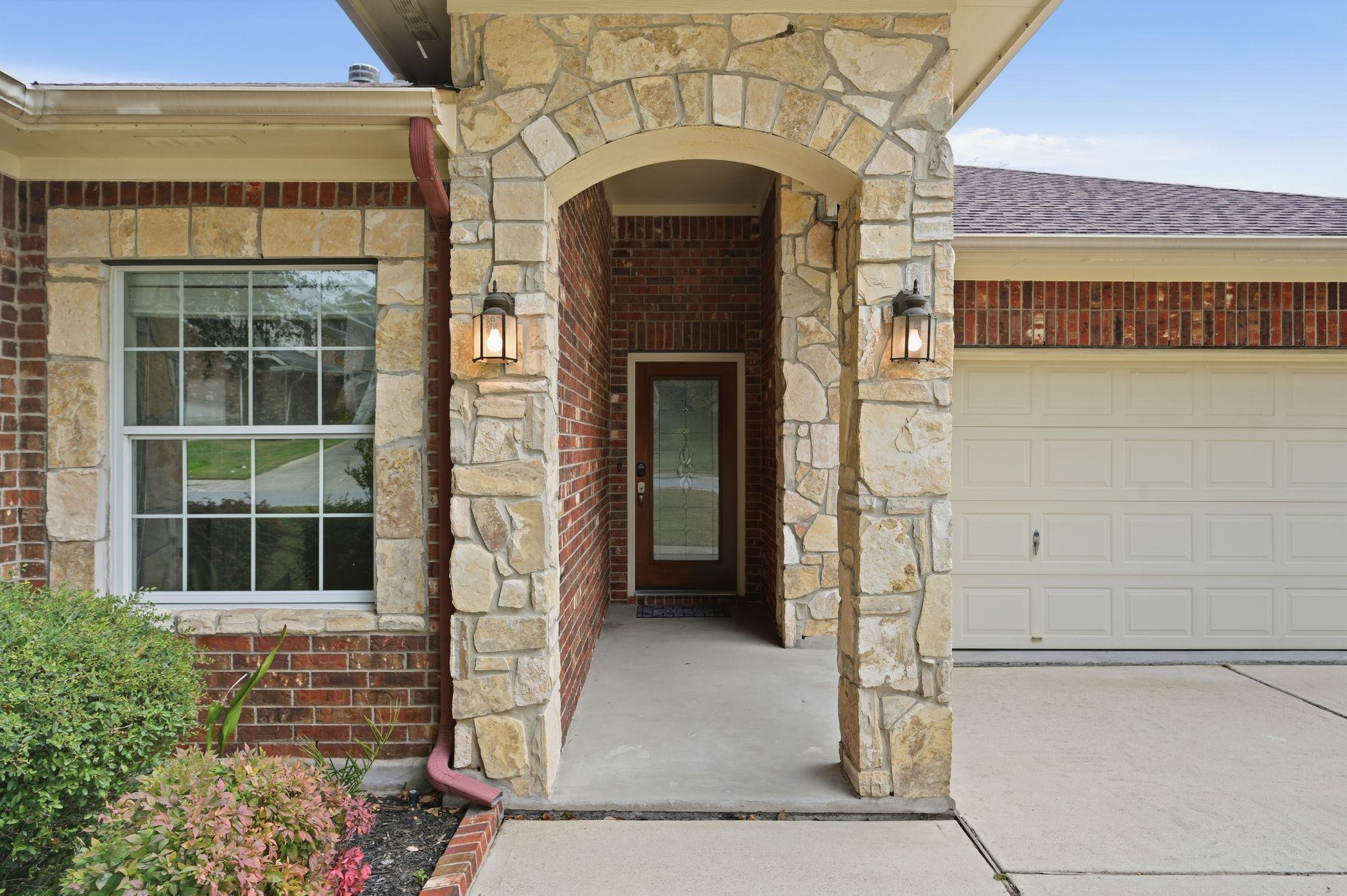 202 Muscovy Lane Cedar Park, TX 78613 - Photo 33 of 34 a front view of a house with large windows