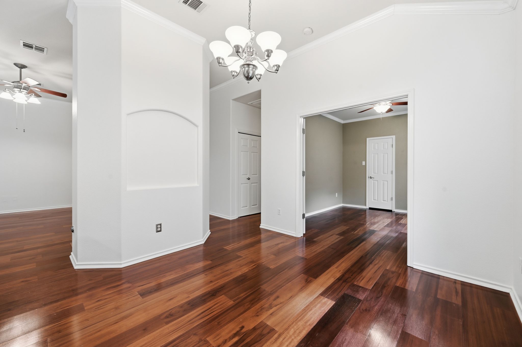 202 Muscovy Lane Cedar Park, TX 78613 - Photo 10 of 34 a view of a room with wooden floor and chandelier
