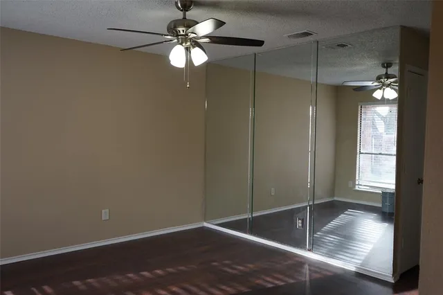 a view of a room that has a window in it