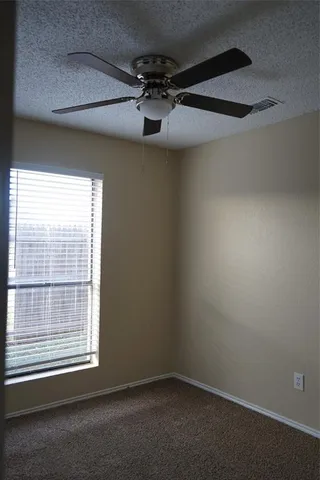 en empty room with windows