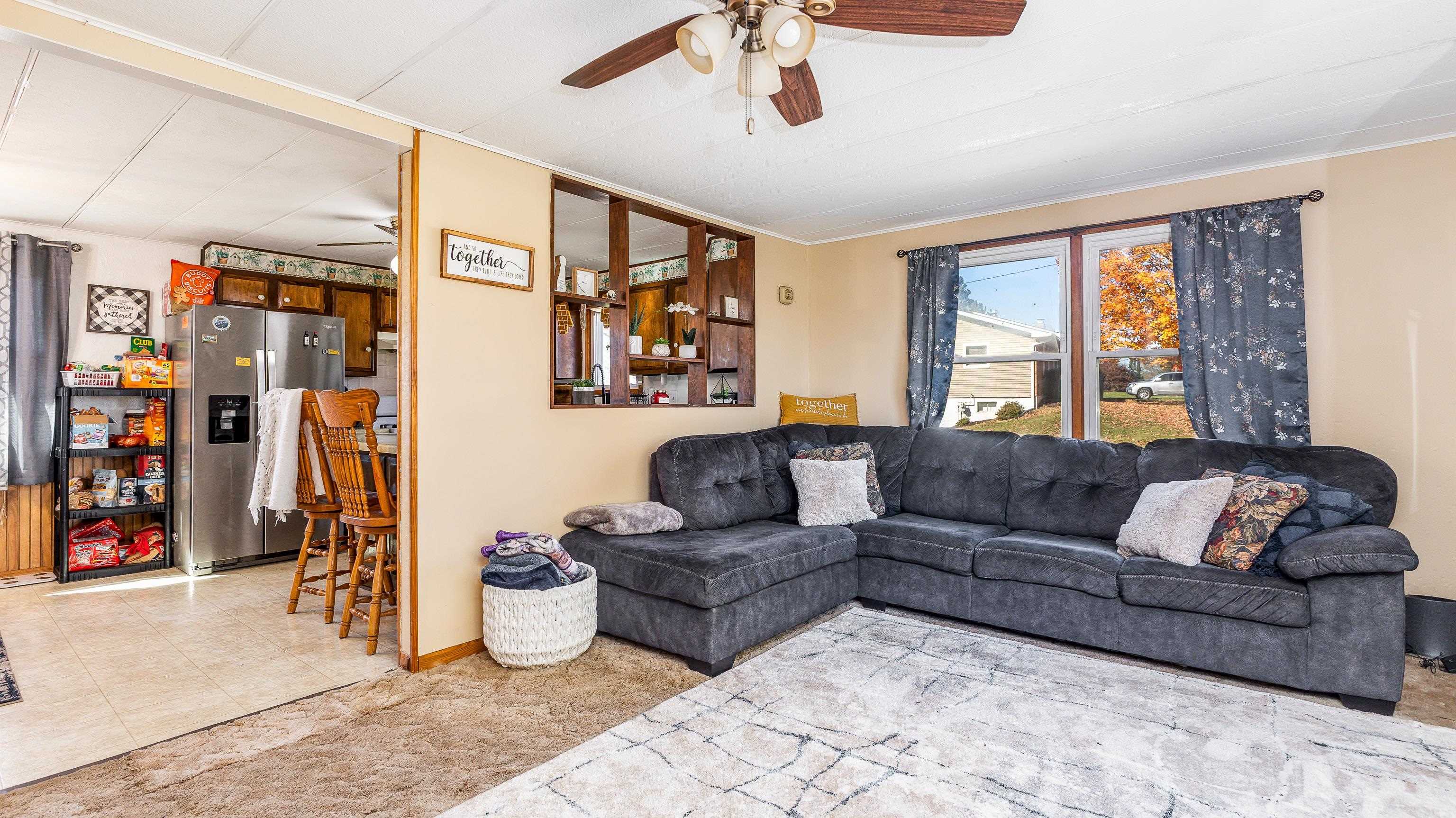 620 Clinton Street Galena, IL 61036 - Photo 11 of 37 a living room with furniture and a window