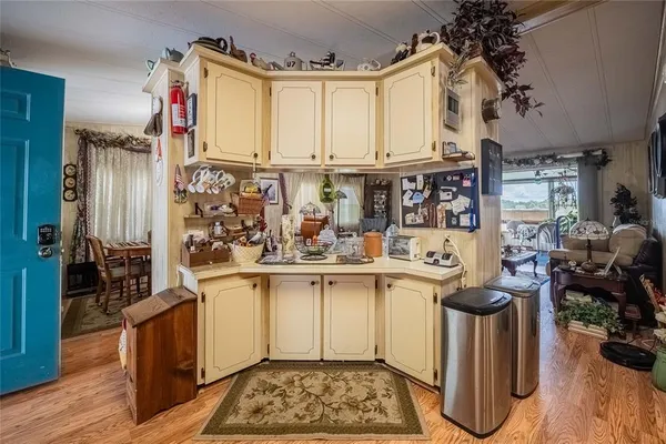 a kitchen with stainless steel appliances granite countertop a sink and cabinets