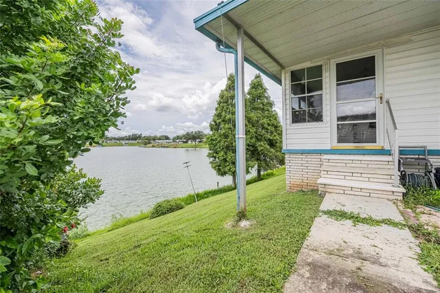 a view of a back yard of the house
