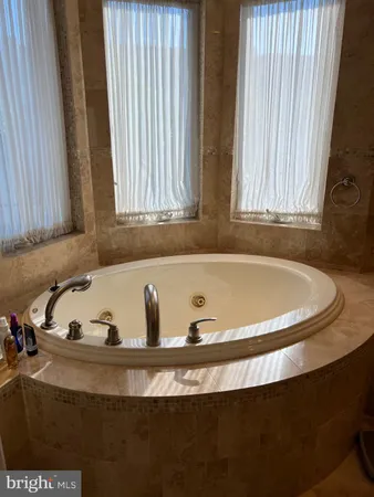 a view of a bathtub in a bathroom