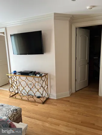 a view of entryway with wooden floor