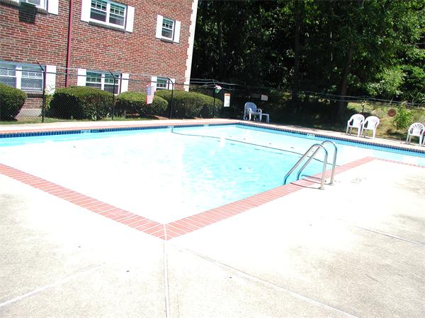 9 Cass Street, Unit 2 Boston, MA 02132 - Photo 5 of 5 a view of a swimming pool with a patio