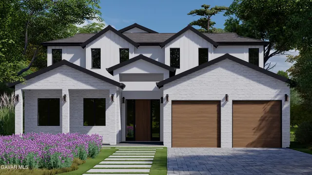 a front view of a house with yard