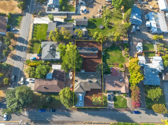 front view of a houses with a yard