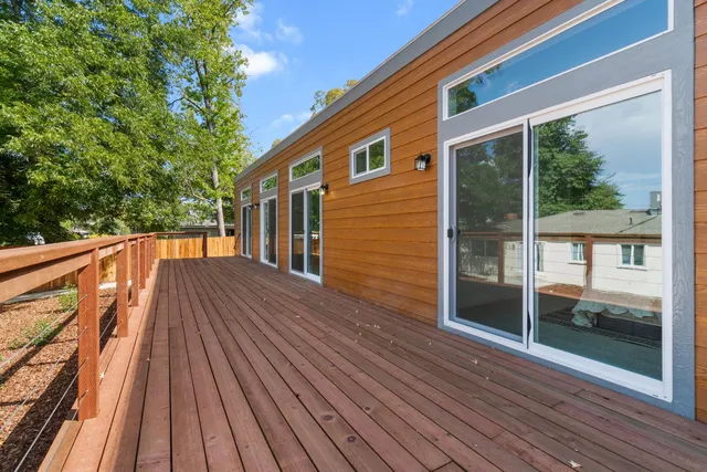 a balcony with wooden floor