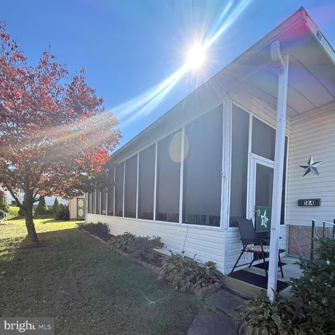 a view of a back yard of the house