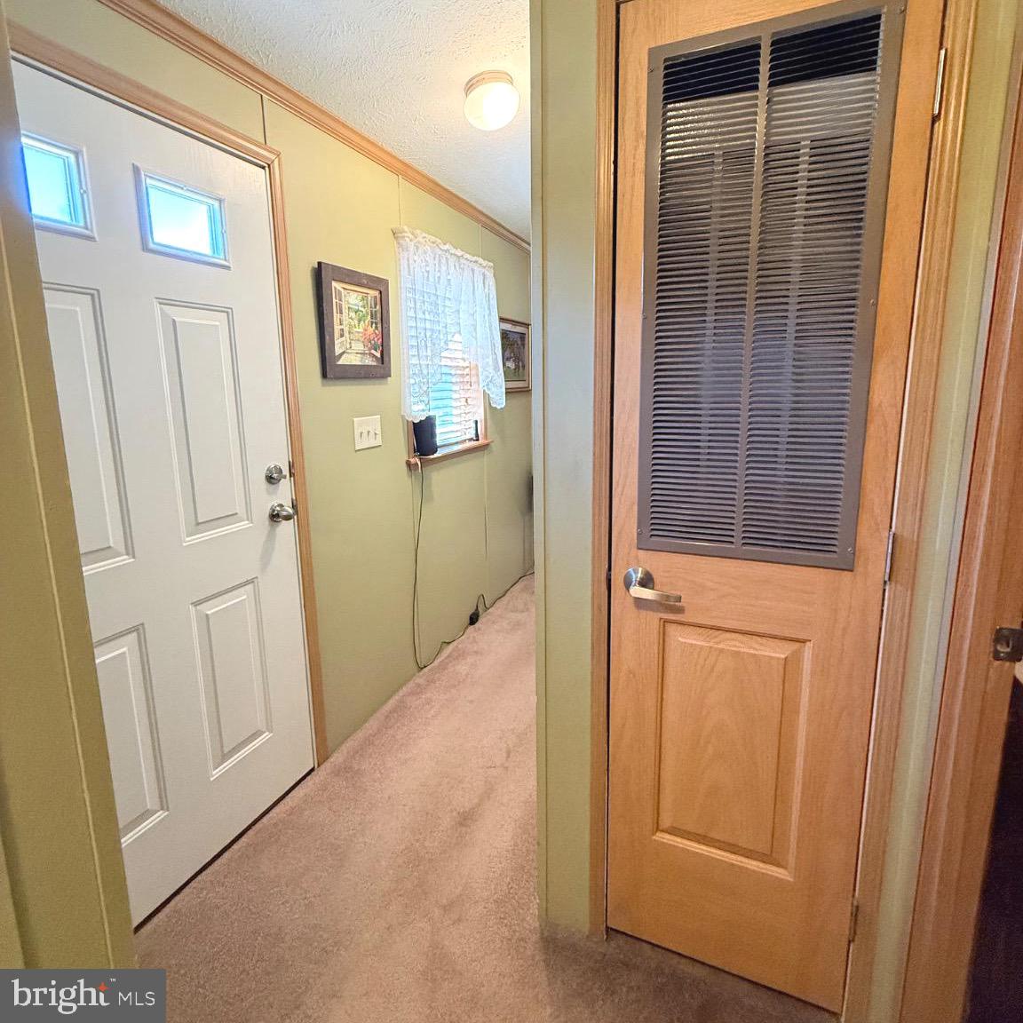 184 5th Avenue Media, PA 19063 - Photo 16 of 30 a view of a hallway with wooden floor and entryway