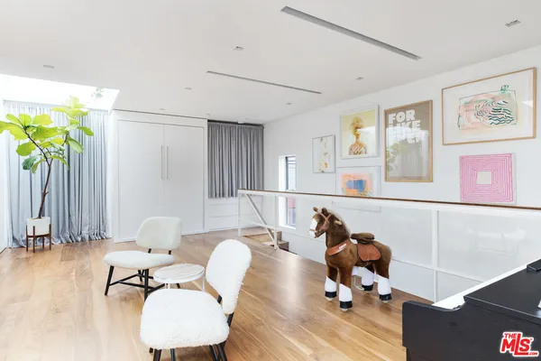 a bedroom with furniture and a bed