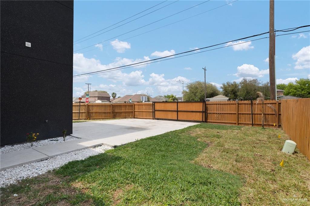 801 East Azucar Avenue Pharr, TX 78577 - Photo 19 of 19 View of yard featuring a patio and a fenced backyard