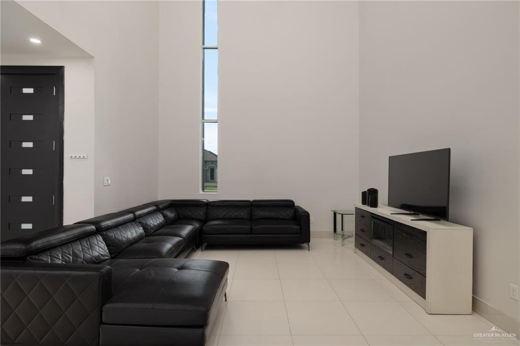 801 East Azucar Avenue Pharr, TX 78577 - Photo 3 of 19 Living room featuring light tile patterned floors