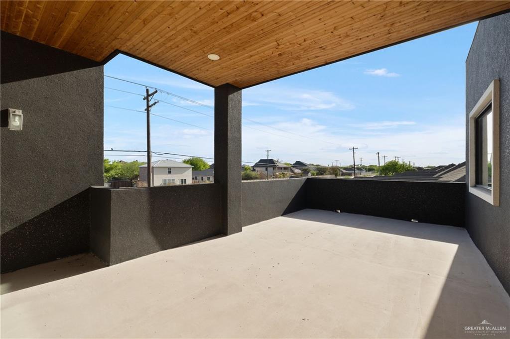 801 East Azucar Avenue Pharr, TX 78577 - Photo 9 of 19 View of patio / terrace featuring a balcony