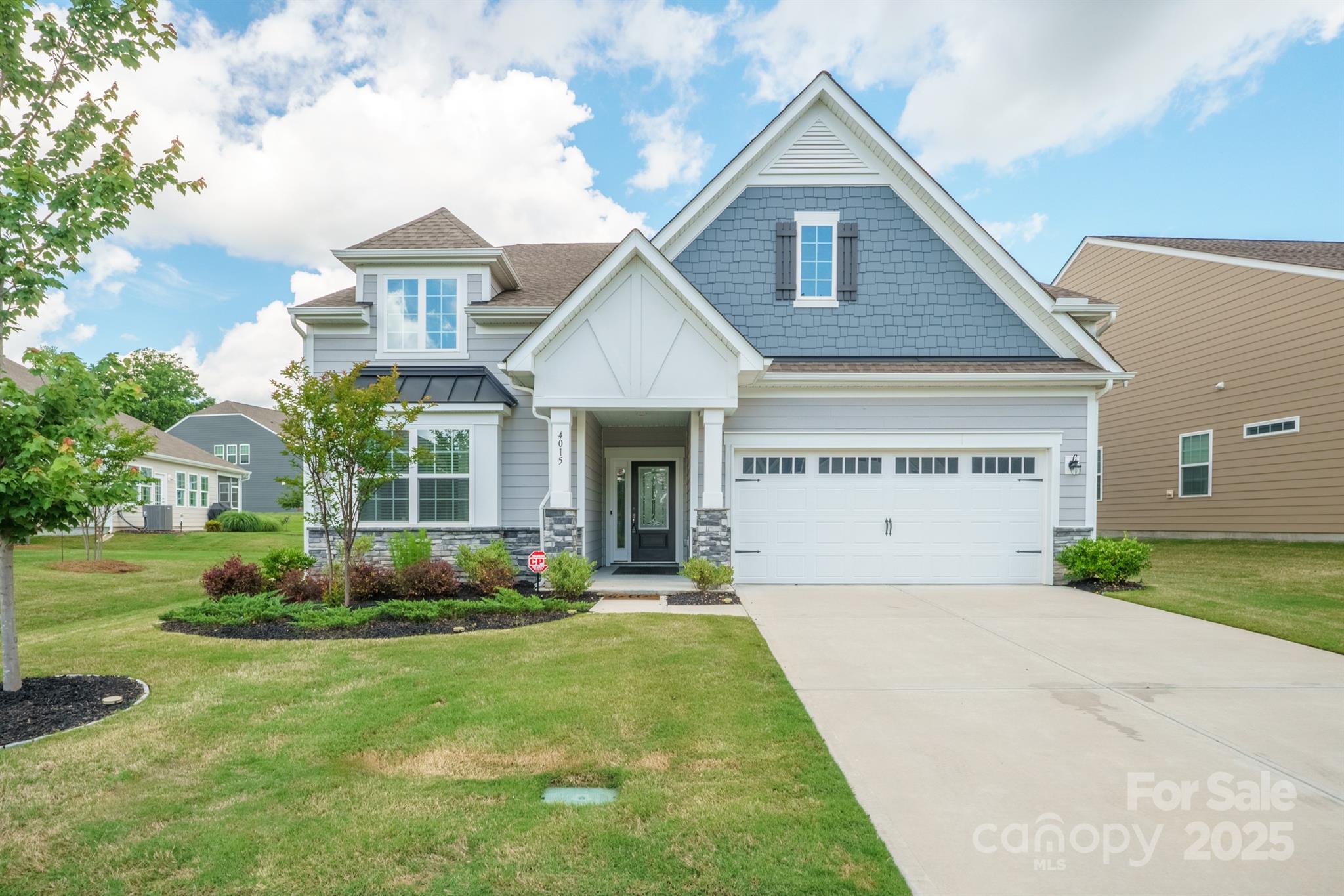 4015 Havenport Circle Fort Mill, SC 29708 - Photo 1 of 47 a view of a house with garden